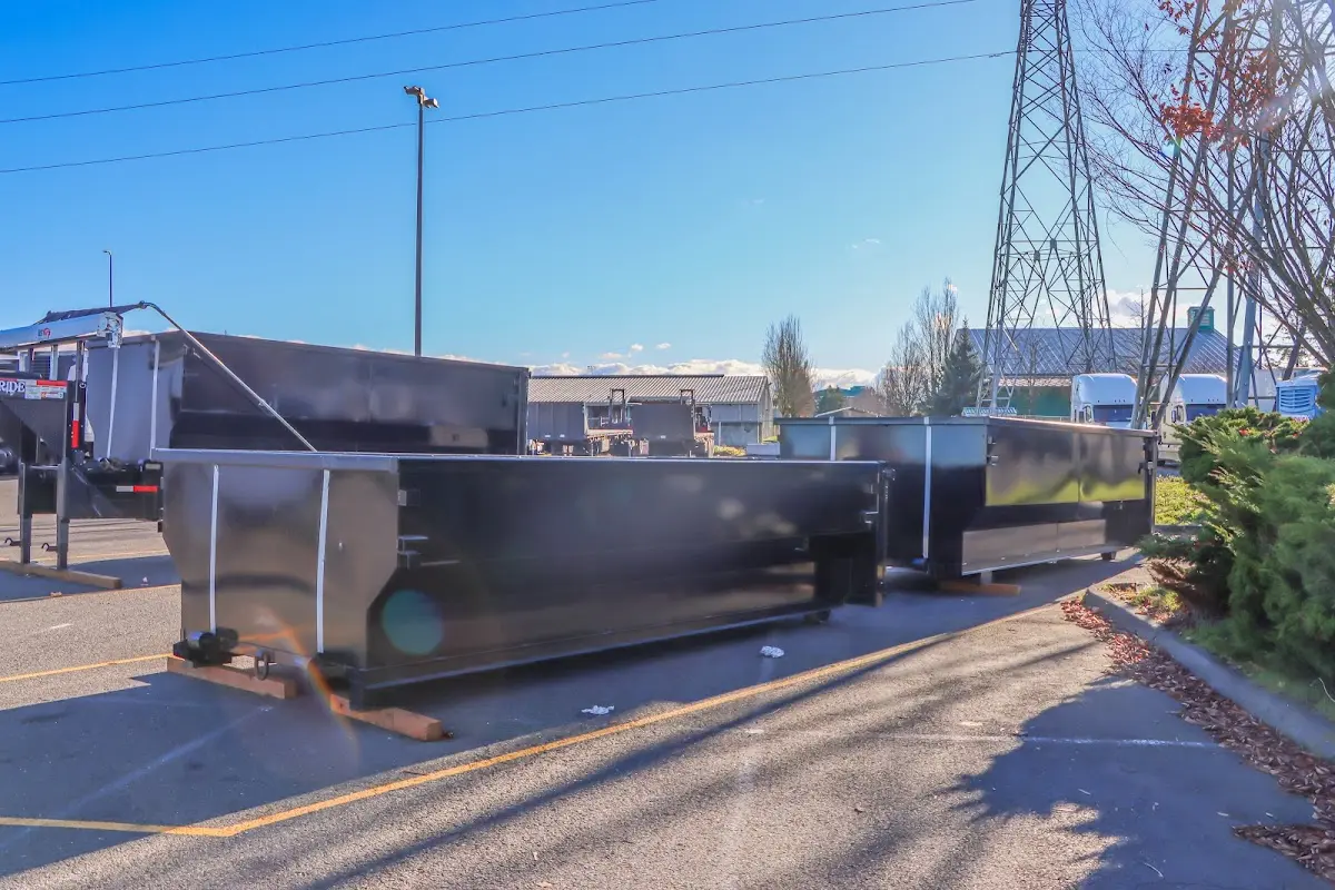 Roll-off dumpster ready for waste disposal at job site for Roofing Dumpster Rental in Gray